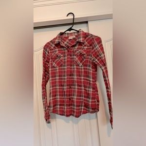 American eagle flannel. Size medium but fits more like Extra small/small